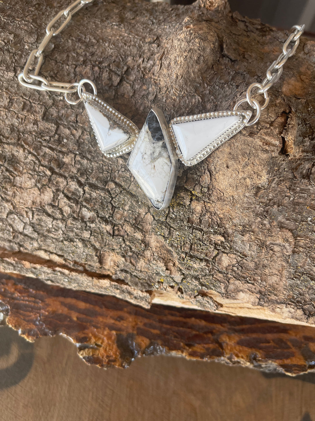 Triple stone white buffalo pendant